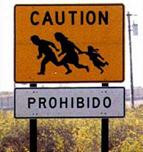 http://mylifeasanalien.files.wordpress.com/2008/05/illegal-immigrant-sign.jpg